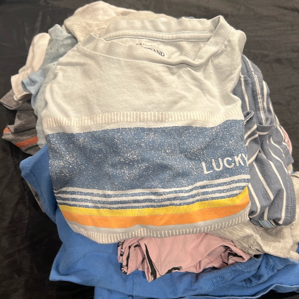Bundle of youth boy shirts with varying sizes